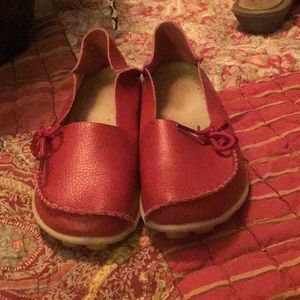 Red leather flats
